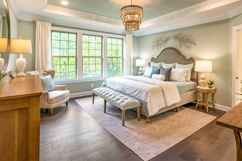 Interior view of a bedroom in a model home at Del Webb Florham Park in New Jersey
