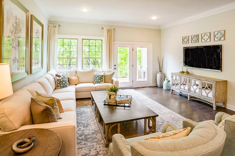 Interior view of a living room in a model home in Del Webb Florham Park in Florham Park, New Jersey