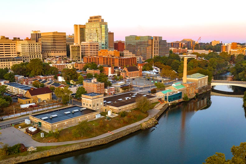 Aerial shot of the Wilmington, Delaware skyline on the Cristina River at sunrise