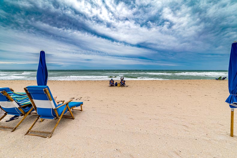 Beach chairs and umbrellas along the picturesque shore in Delray Beach, Florida