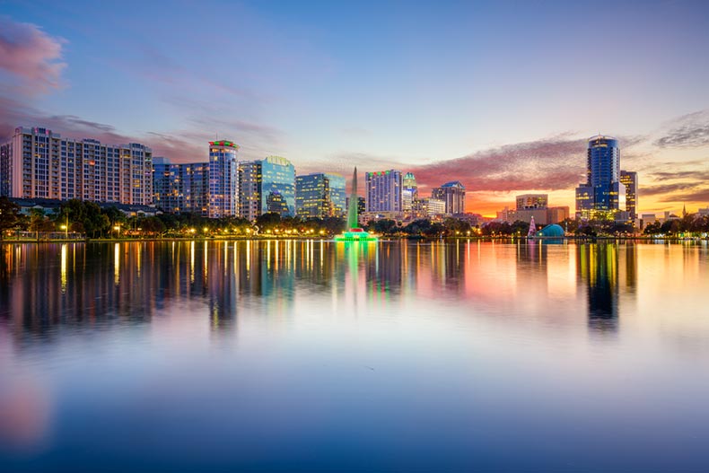 View across Eola Lake of the downtown skyline in Orlando, Florida