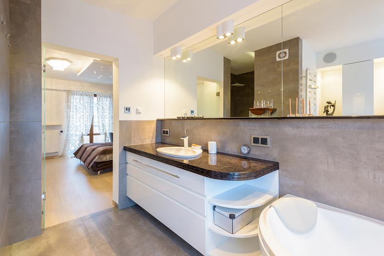 A modern en suite bathroom in a new luxury home