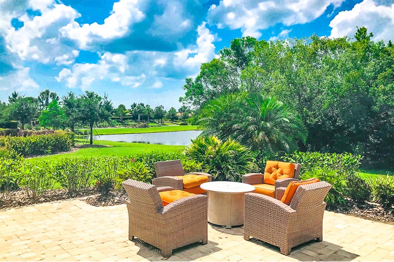 Lounge chairs on the patio at Esplanade at Artisan Lakes in Palmetto, Florida