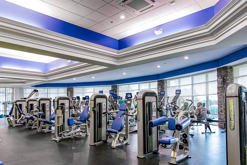 Interior view of the state-of-the-art fitness center at On Top of the World in Ocala, Florida