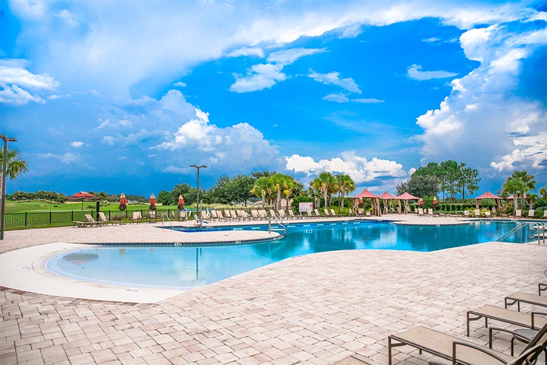 A blue sky over the outdoor pool at On Top of the World in Ocala, Florida