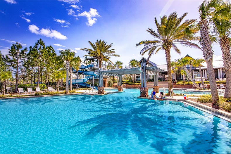 View of the outdoor pool near the clubhouse at WaterSong at RiverTown in St. Johns, Florida