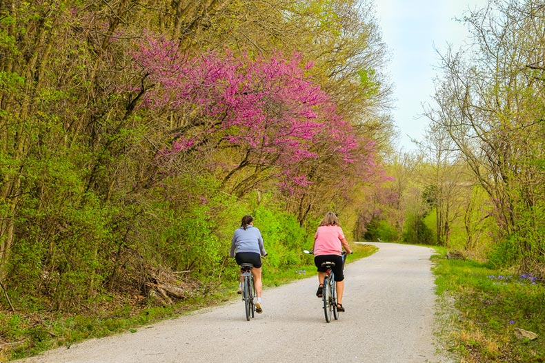 Two female bicyclist on the trail during the spring in Missouri