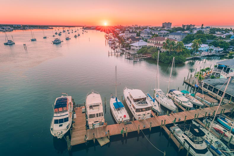 Aerial view of boats at a dock in Fort Myers, Florida at sunset