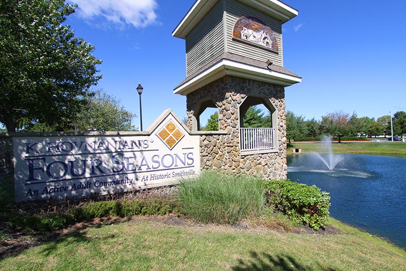 A fountain beside the community sign for Four Seasons at Smithville in Galloway, New Jersey