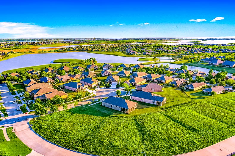 Aerial view of homes, lakes, and greenspaces in Frisco Lakes, located in Frisco, Texas