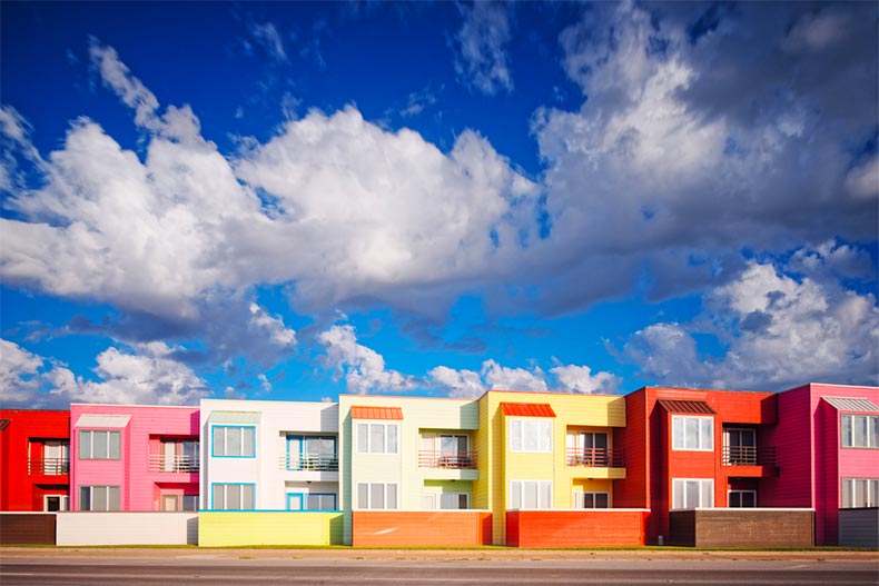 A blue sky over colorful seaside homes in Galveston, Texas