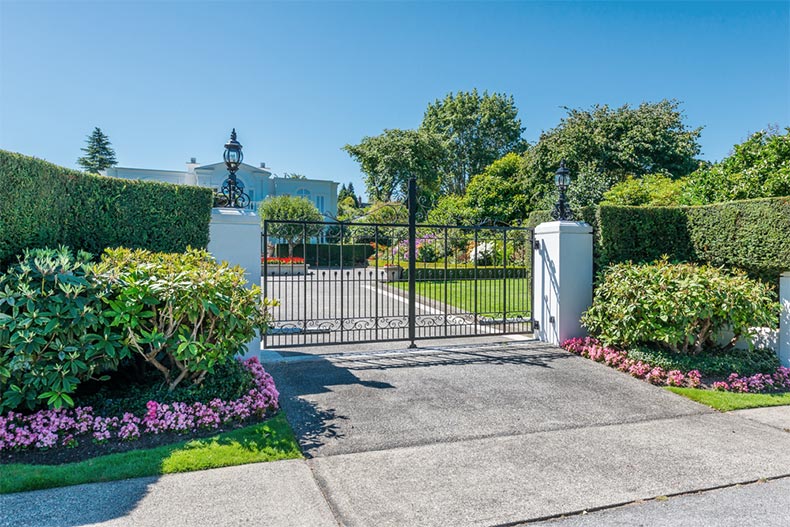 Picturesque landscaping surrounding a closed community gate