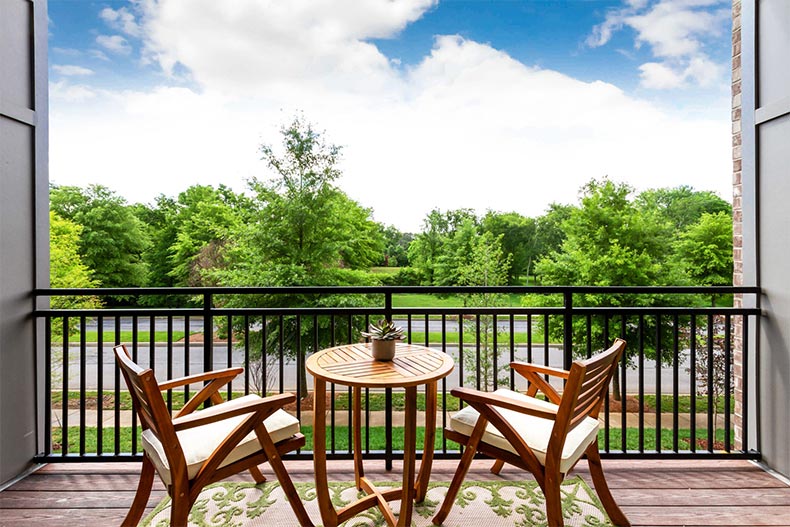 A table and chairs on the patio of a home in Gatherings at Indian Lake in Hendersonville, Tennessee