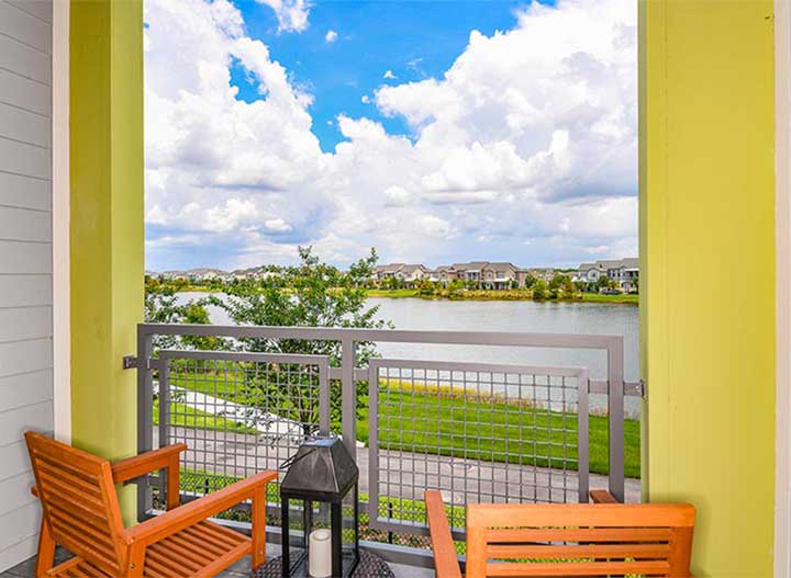 Homes at Gatherings at Lake Nona overlook a scenic view.