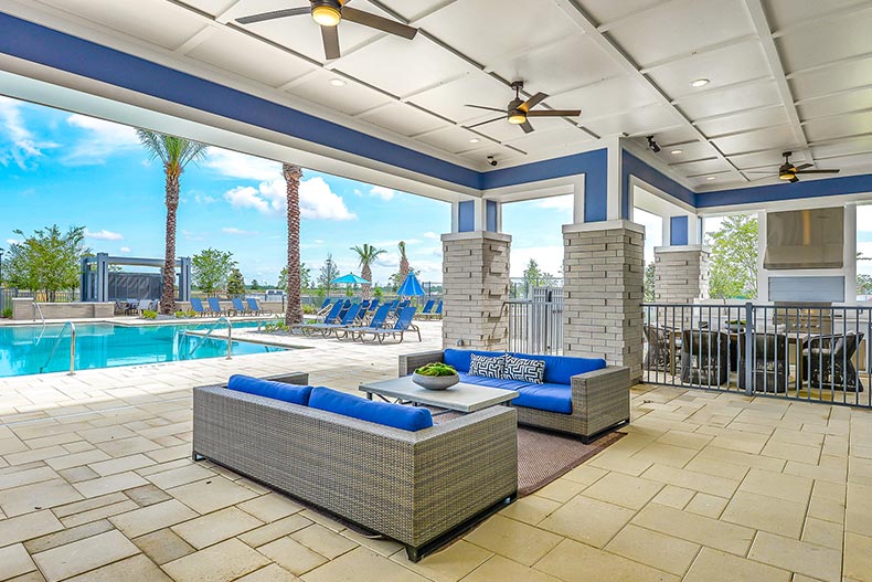 The patio area and outdoor pool at Gatherings of Lake Nona in Orlando, Florida