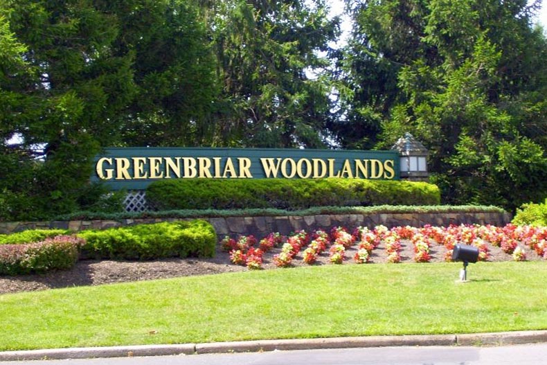 The community sign for Greenbriar Woodlands in Toms River, New Jersey