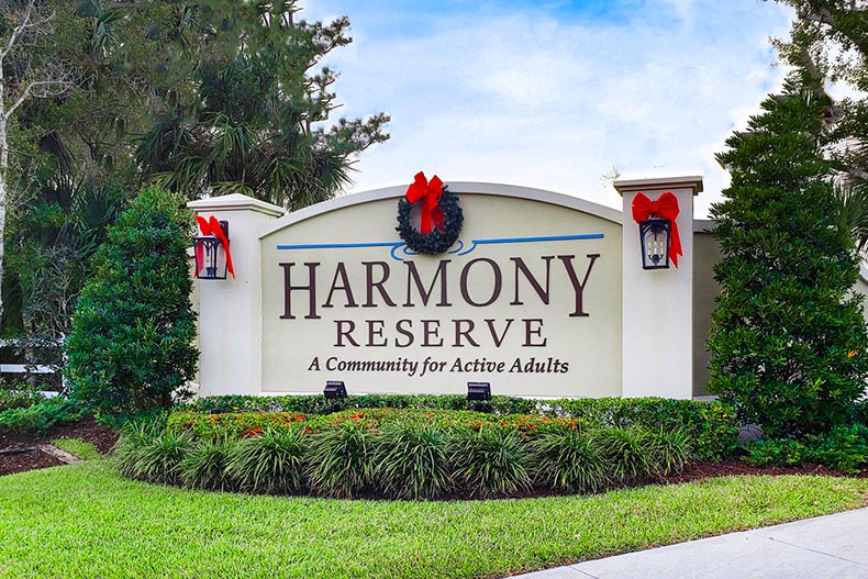 Greenery surrounding the community sign for Harmony Reserve in Vero Beach, Florida