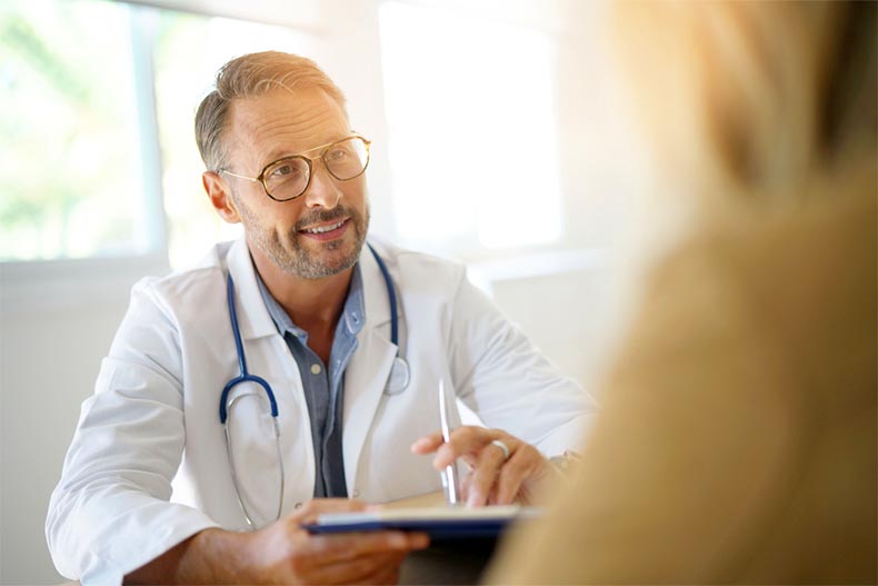 A doctor with a patient in a medical office