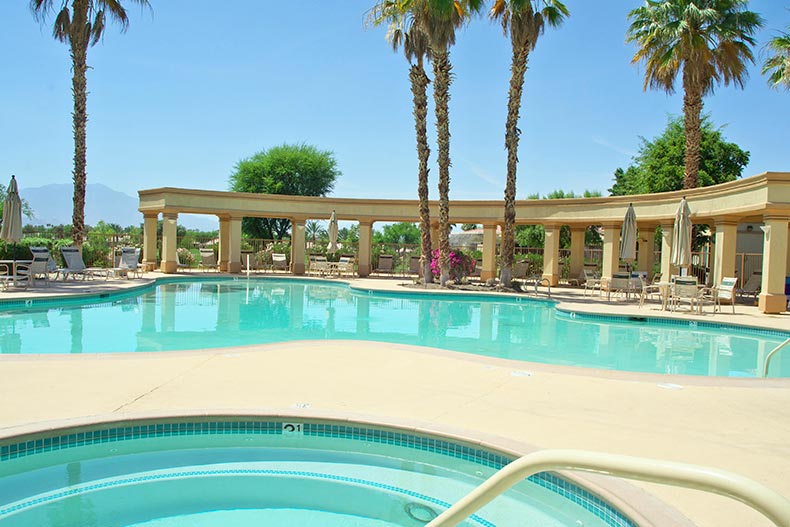 The outdoor pool and whirlpool spa at Heritage Palms in Indio, California
