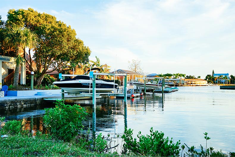 Luxury waterfront houses with docked boats in Hernando, Florida