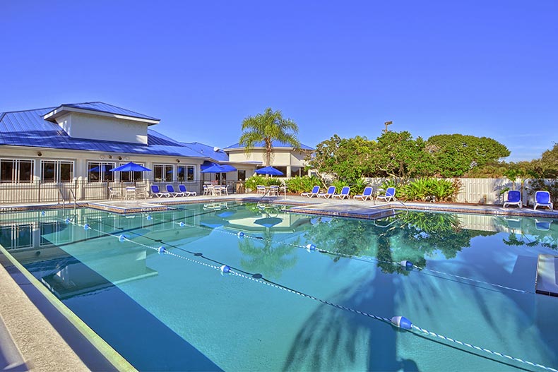 The outdoor pool and patio at Indian River Colony Club in Melbourne, Florida