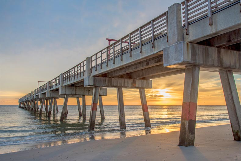 A sunrise over the pier at Jacksonville Beach in Florida