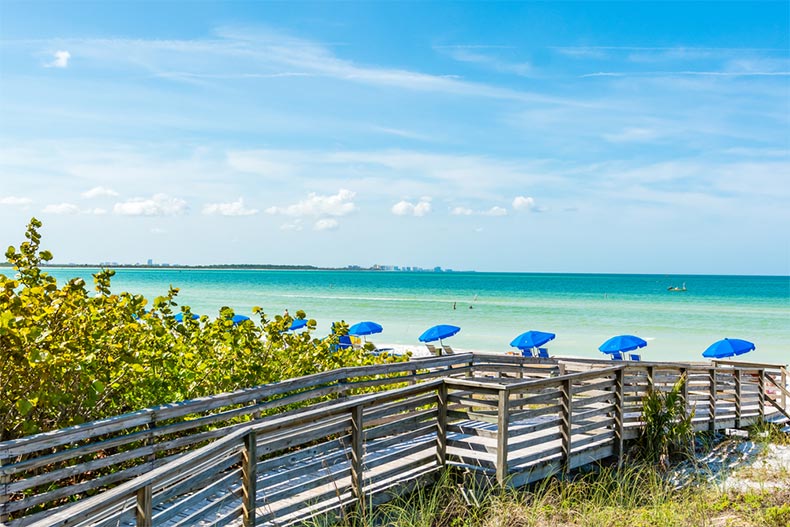 A wooden boardwalk along the beach in Tampa, Florida