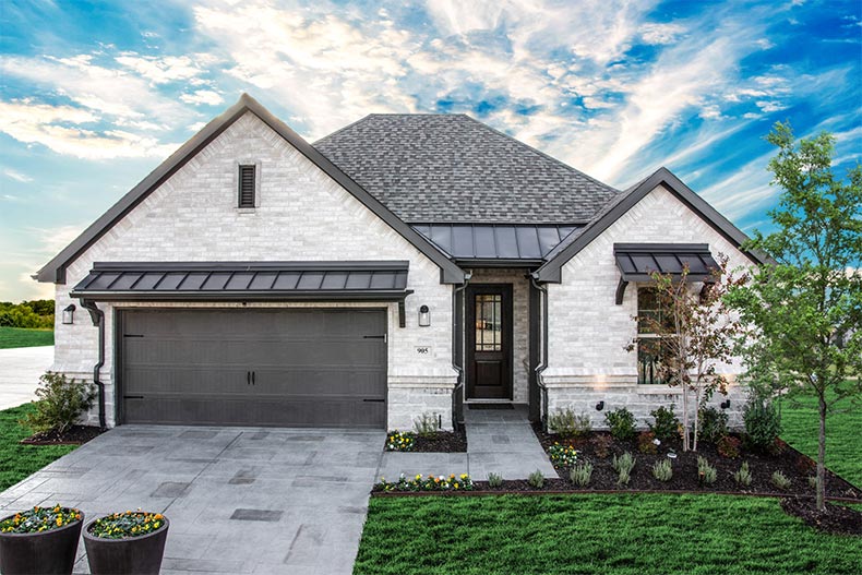 Exterior view of a model home in Ladera Rockwall in Rockwall, Texas