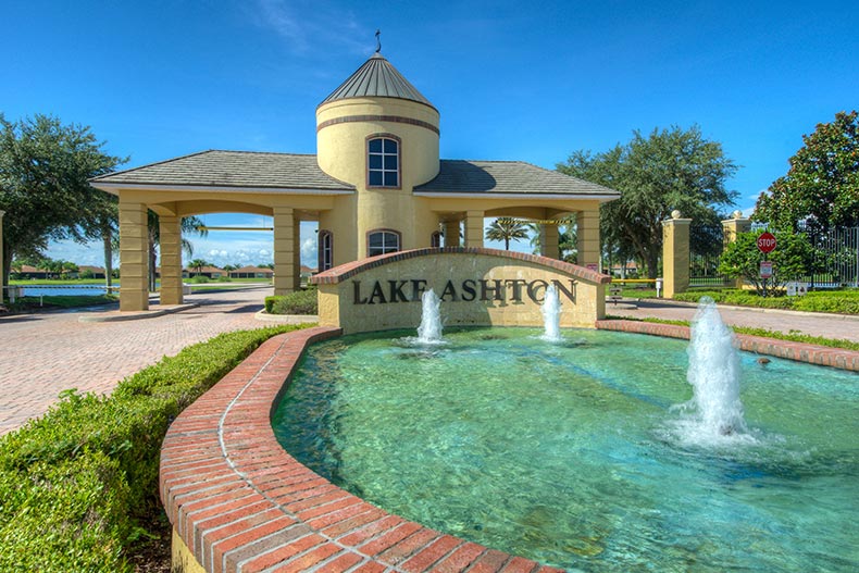 A fountain in front of the community sign for Lake Ashton in Lake Wales, Florida