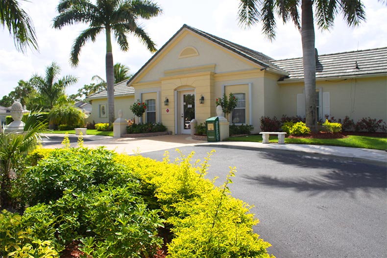 Palm trees beside a community building at Lake Forest in Port St Lucie, Florida