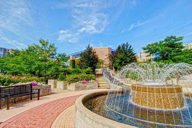 An outdoor fountain in a picturesque courtyard at Lansdowne Woods of Virginia in Lansdowne Woods, Virginia