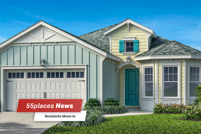 A 3D render of a blue and yellow home exterior in Latitude Margaritaville with a graphic overlay in the corner saying "55places News, Residents Move-In"