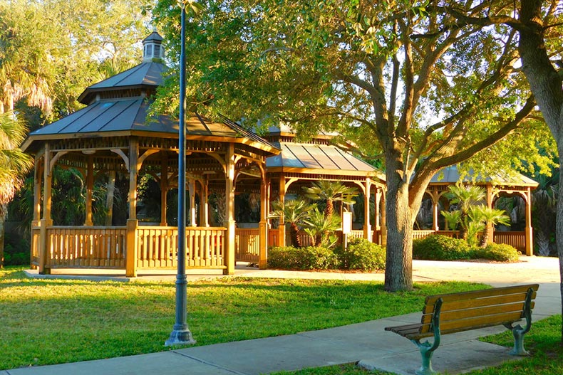 A bench beside a gazebo in a park in Melbourne, Florida