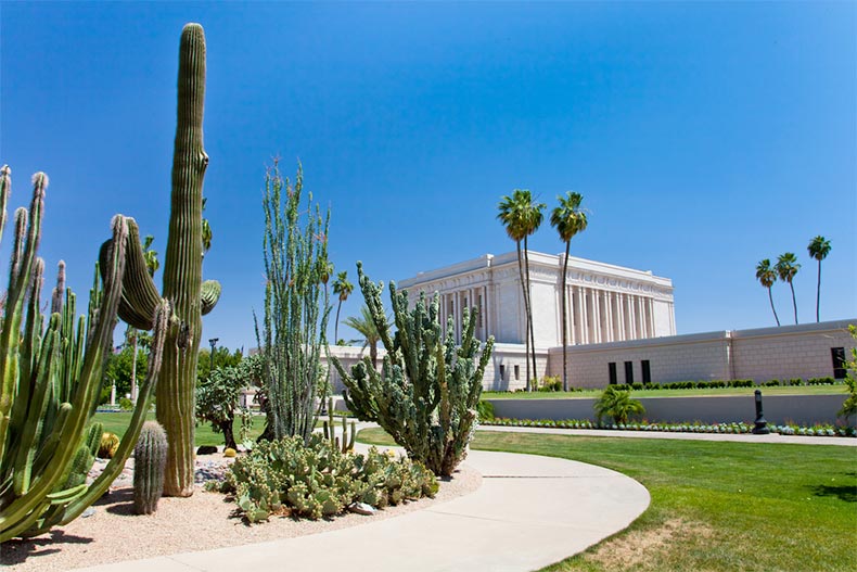 A temple in Mesa, Arizona with cacti in the foreground