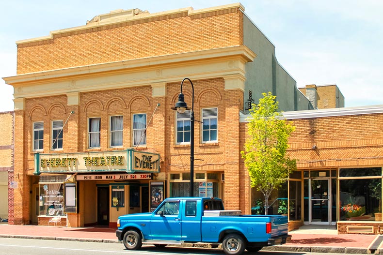 Blue pick-up truck on the street in front of the Everett Theatre in Middletown, Delaware