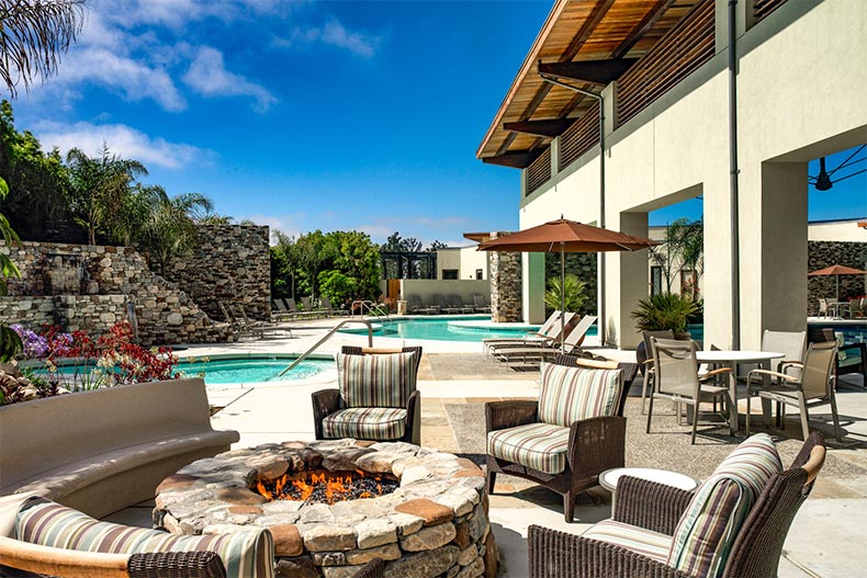 Exterior view of the outdoor pool and patio at Trilogy at Monarch Dunes in Nipomo, California