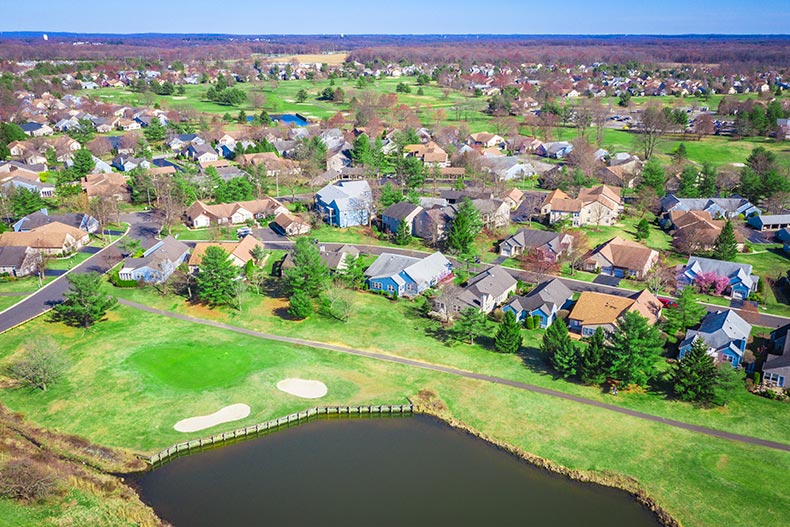 Aerial view of houses beside a golf course in Monroe, New Jersey