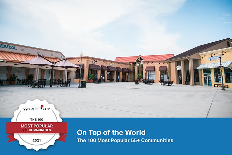"The 100 Most Popular 55+ Communities" badge over a public square in On Top of the World in Ocala, Florida