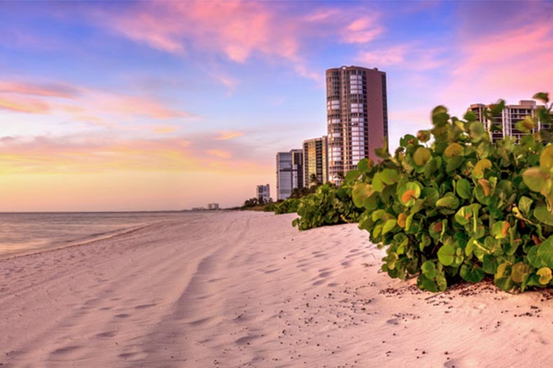 Sunset over North Gulf Shore Beach along the coastline of Naples, Florida