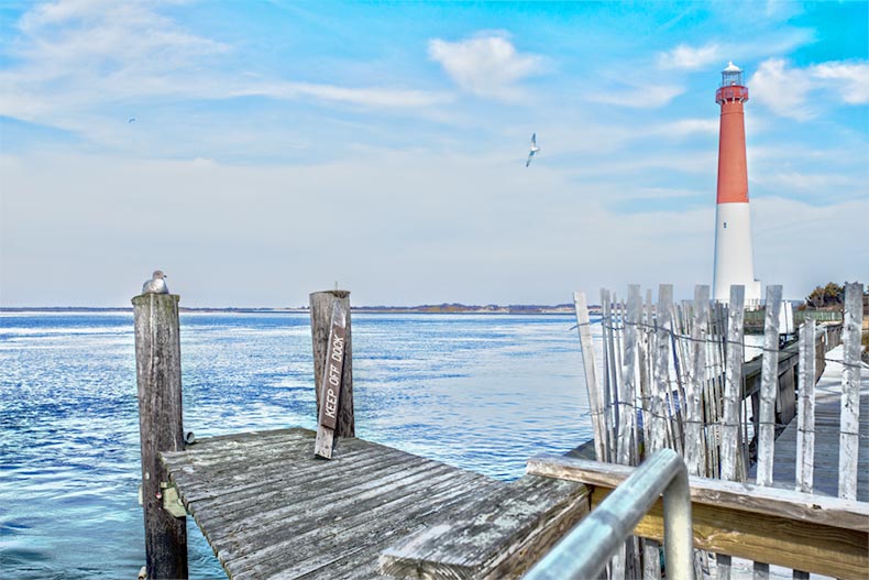 View of Barnegat lighthouse from the docks at Barnegat Bay along the coast of Ocean County, New Jersey