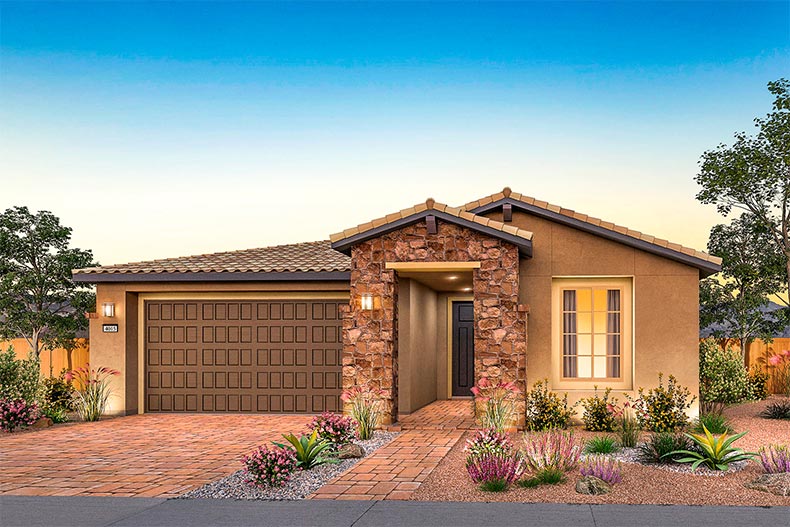 Exterior view at sunset of a model home in Del Webb at Lake Las Vegas in Henderson, Nevada