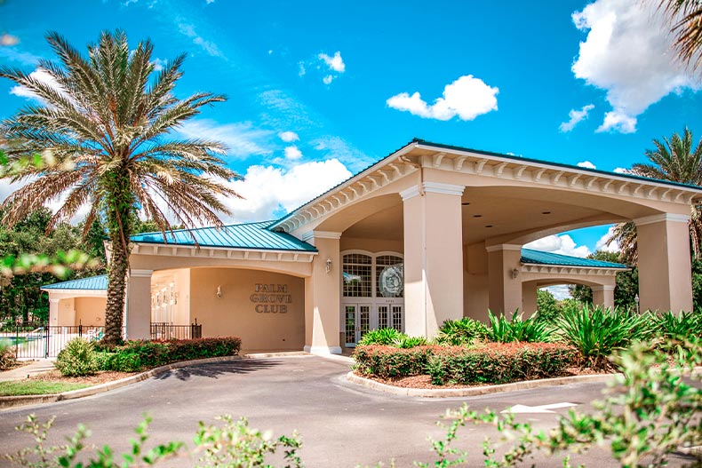 Exterior photo of the Palm Grove Club clubhouse in Oak Run in Ocala, Florida