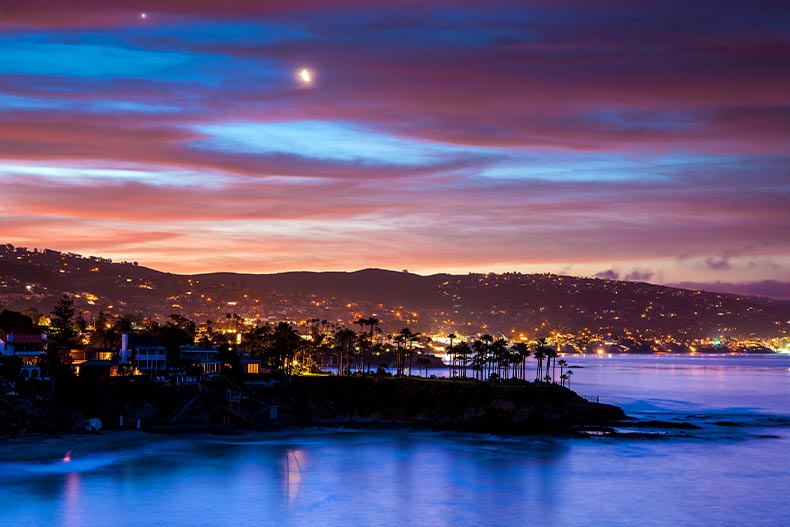 Orange County, California coastline at night dotted with city lights