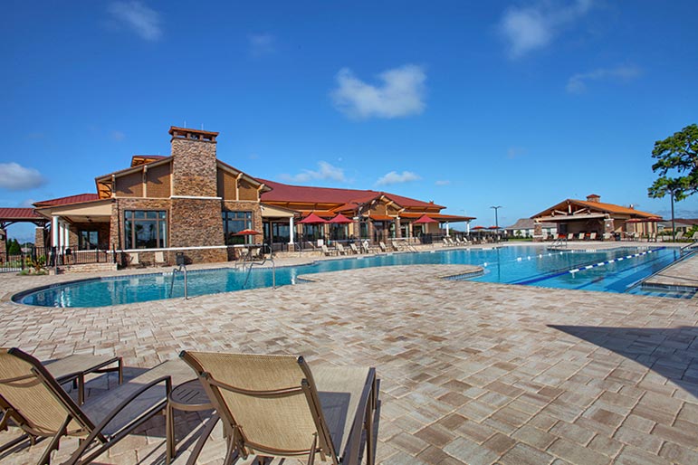 View of the clubhouse and outdoor pool at On Top of the World