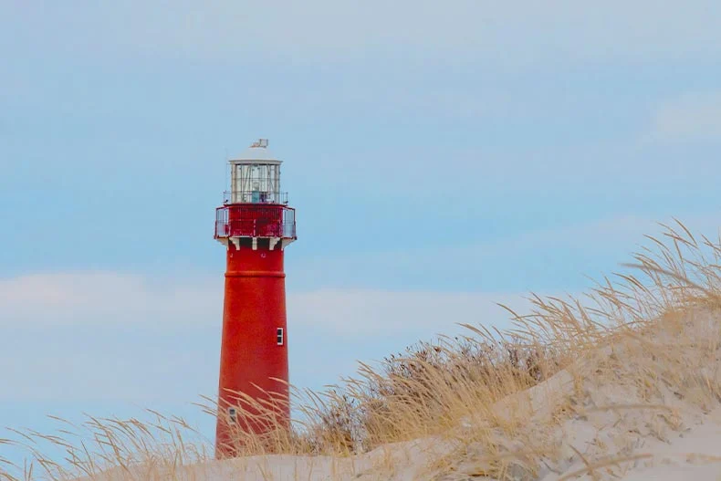 Photo of the Barnegat Lighthouse and dunes in Ocean County, New Jersey