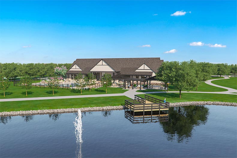 A rendering of the clubhouse beside a picturesque pond at Osborne Trails in Westfield, Indiana