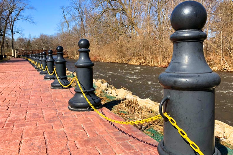 A chain barrier along a public path by Waubonsie Creek in Oswego, Illinois