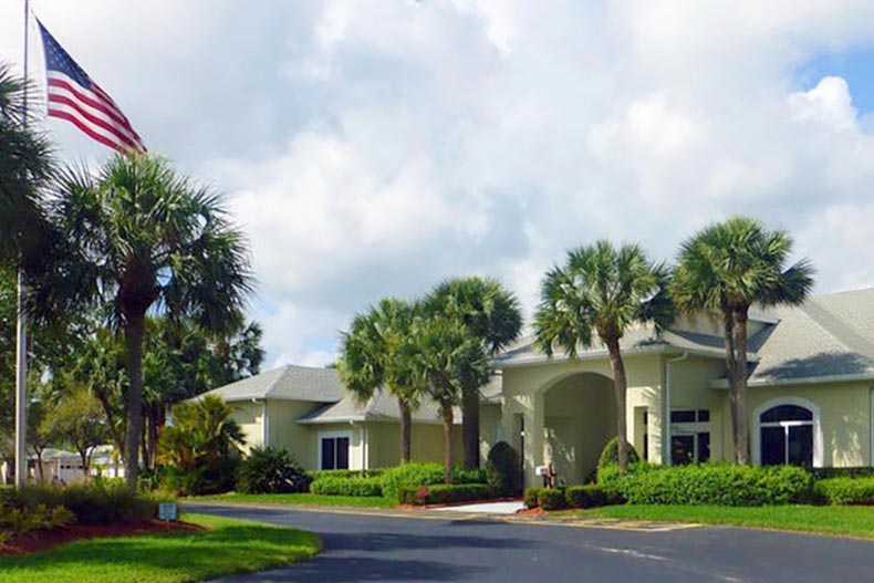 Palm trees beside a community building at Palm Grove in Fort Pierce, Florida