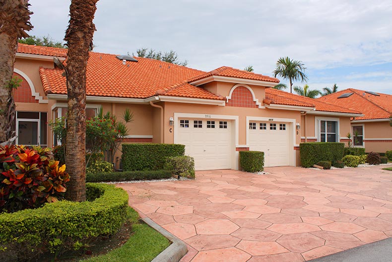 Exterior photo of attached homes in the Palm Isles 55+ community in Boynton Beach, Florida