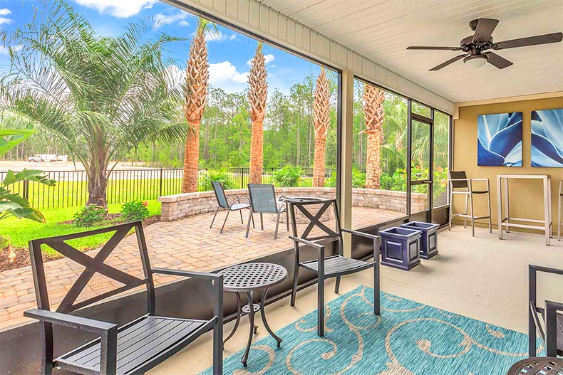 An outdoor living area in a model home at Parkland Preserve in Saint Augustine, Florida